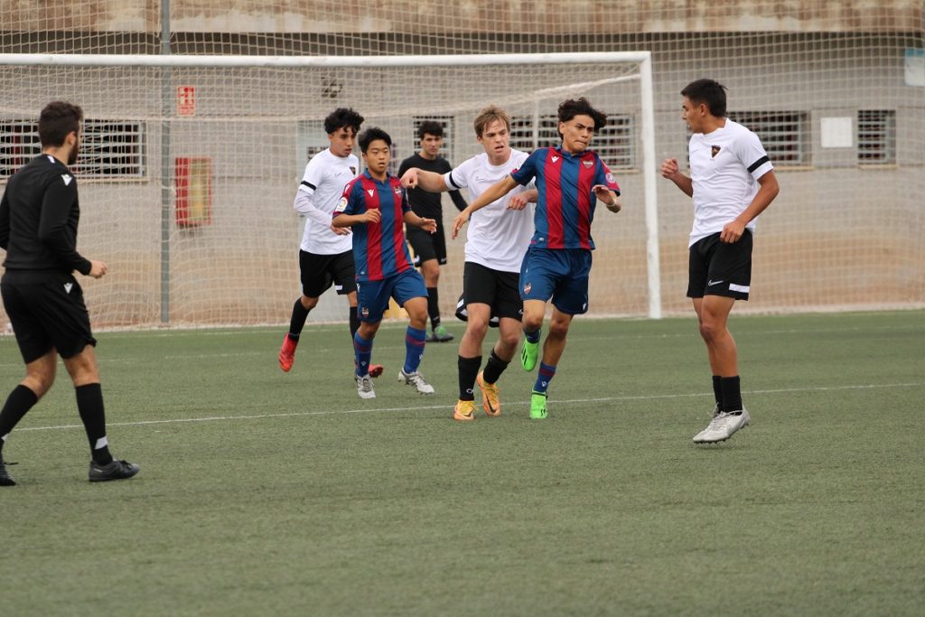 football match in academy in spain